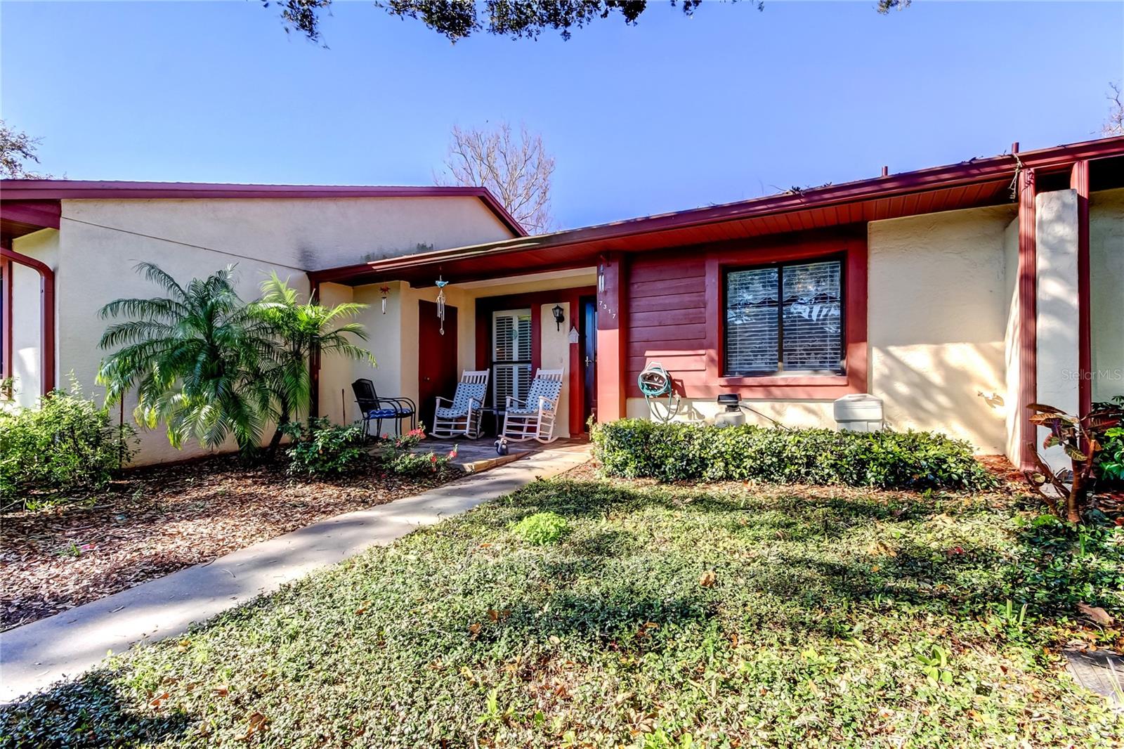 SNOWBIRDS OR DOWNSIZING? THIS PICTURE PERFECT, MOVE-IN READY CONDO IS PRICED TO SELL. FRONT PORCH OVERLOOKING A PRETTY POND, WELCOMES YOU INTO A BRIGHT AND OPEN LIVING AREA. LAMINATE AND CERAMIC FLOORING THRU OUT WITH NO CARPET. ROOF 2015(COVERED BY ASSOCIATION), AC 2021 AND WATER HEATER 2021. ENCLOSED LANAI WITH HEAT AND AIR AND INDOOR LAUNDRY. PRIMARY BEDROOM W/ENSUITE BATH AND WALK-IN CLOSET. LARGE HALLWAY PANTRY/STORAGE CLOSET, NO REAR NEIGHBORS. 1 CAR CARPORT AND GUEST PARKING, COMMUNITY POOL AND ONE CAT or ONE DOG ALLOWED. FURNISHINGS ARE NEGOTIABLE. THIS IS A MUST SEE!