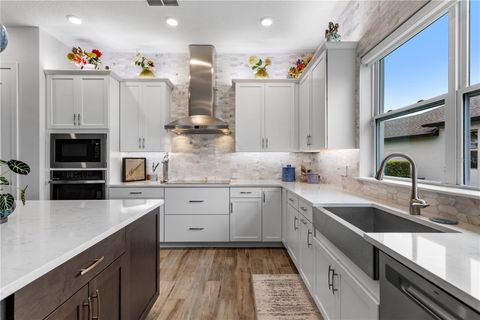 Tiny photo for 17064 Secret Hollow Loop, Clermont, FL 34711 (MLS # O6342733)