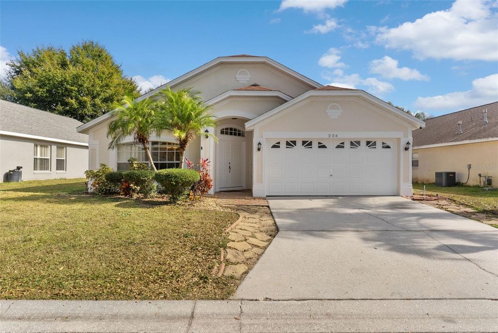 Photo of 226 Jessamine Drive, Davenport, FL 33837 (MLS # O6376906)