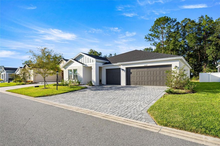 Welcome home to this beautifully completed 2025 Built New Home complete with remaining 1/10 home warranty - why wait for construction timelines. This spacious Palmetto model features 2 bedrooms plus den or flex room, 2 baths and a 3 car garage, 1,810 living sq ft open floorplan.  A thoughtfully designed single-story smart home nestled on a PREMIUM LOT in the sought-after 55+ gated community of Cherrywood Preserve. No rear neighbors! Upon entry in the foyer, a private guest bedroom and bath await, perfect for guests or multi generational living. The versatile den or flex room offers a great space for working from home, craft room or a quiet retreat. At the heart of the home, the open-concept kitchen, dining, and great room are perfect for entertaining and everyday living with LVP flooring throughout. The modern kitchen is ready for any level gourmet chef with Whirlpool appliances, ample Quartz counter space, soft close drawers and cabinetry. Off the expansive great room is a screened lanai, perfect for enjoying Florida’s indoor-outdoor lifestyle. The primary suite is a tranquil sanctuary with a large bedroom, luxurious bath, and generous walk-in closet. Additional features include an interior laundry room, SMART HOME technology such as a smart thermostat, Rainbird irrigation system, and smart door lock and driveway pavers. This is located in the most recent phase of Cherrywood Preserve, a golf cart-friendly community, minutes from The Market at Cherrywood, offering easy access to shopping, dining, and I-75 commuting. Walk over for an ice cream cone after dinner.  Residents enjoy resort-style amenities including a lap and lounge pool, jacuzzi, fitness center, billiards, pickleball, bocce, horseshoes, and more, along with a vibrant calendar of social events year-round. Low HOA include amenities mentioned as well as cable, garbage, security gate. Hurry to start enjoying all of the features offered!