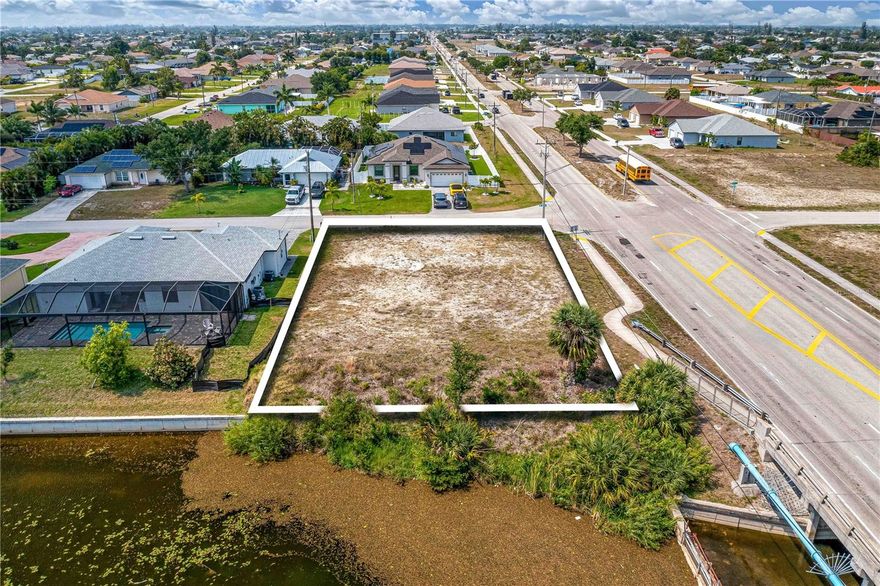Are you ready to live the South West Florida lifestyle? Come and build your dream home on the large waterfront corner lot! Cleared and ready to go.