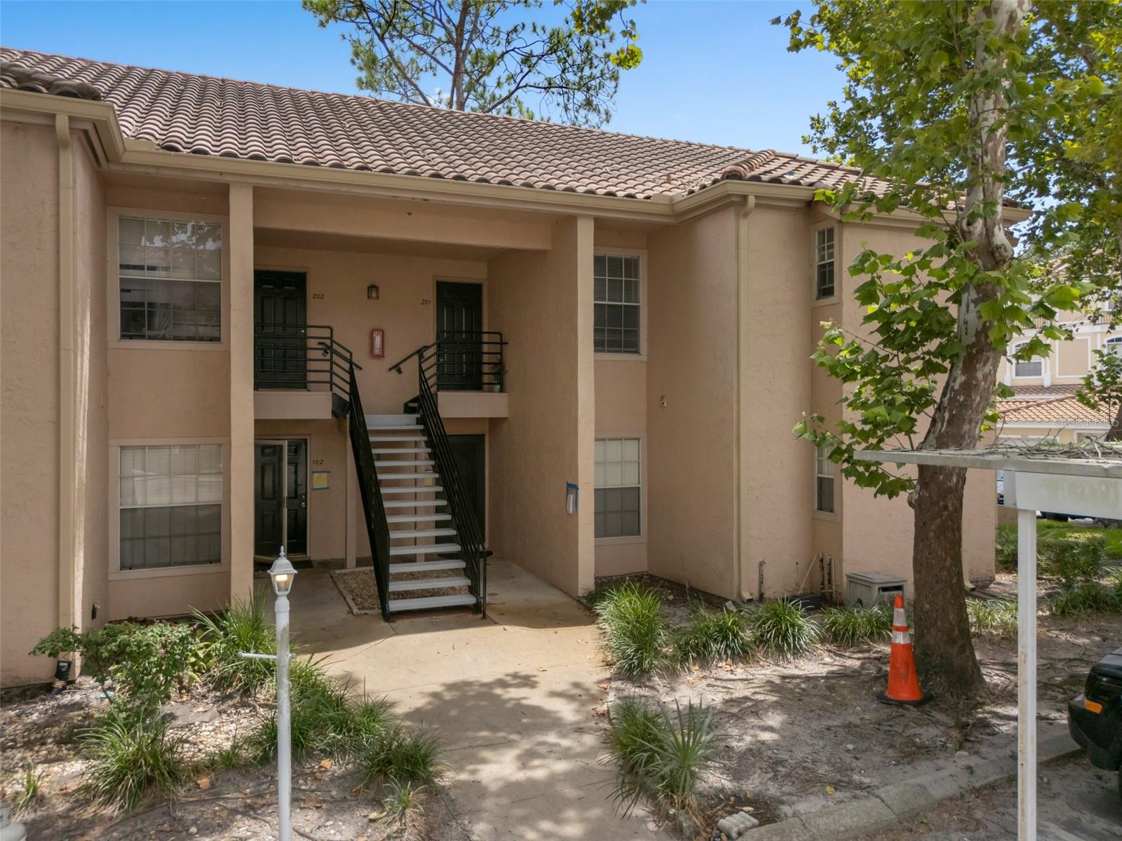 Discover comfort and charm in this second-story condo, boasting 2 bedrooms and 2 bathrooms with vaulted ceilings and an open layout
and natural flow. Step into the spacious living room, where French doors lead to a covered patio, perfect for peaceful Florida evenings. It
includes nearly 1200 square feet of living space and additional storage closet off patio
Inside, a wood-burning fireplace creates a cozy focal point, connecting the living area to a light filled dining space and a cozy kitchen with
all new appliances. Both bedrooms are generously sized, each with its own private bath for convenience and privacy, plus there's an in-unit
laundry for added ease. Whether you're looking for a relaxed lifestyle or a central hub near all the action—this condo delivers the best of
both worlds. Covered parking space. Great Location including: Easy access to I-4 and major highways, Close to Altamonte Mall, Seminole
State College, Restaurants and Shops, Just 30 miles to Disney World and about nine miles north of Downtown Orlando.