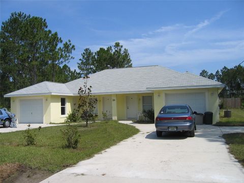 Photo of 21 Slumber Path, Palm Coast, FL 32164 (MLS # FC318294)