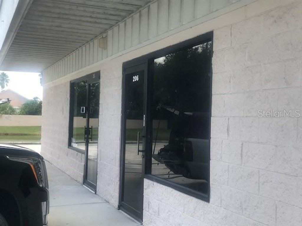 Photo of 11609 S Orange Blossom Trail #206, Orlando, FL 32837 (MLS # G5107903)