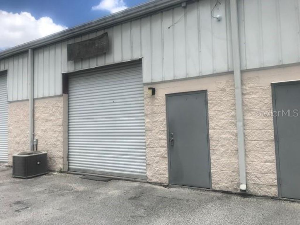 Photo of 11609 S Orange Blossom Trail #206, Orlando, FL 32837 (MLS # G5107903)