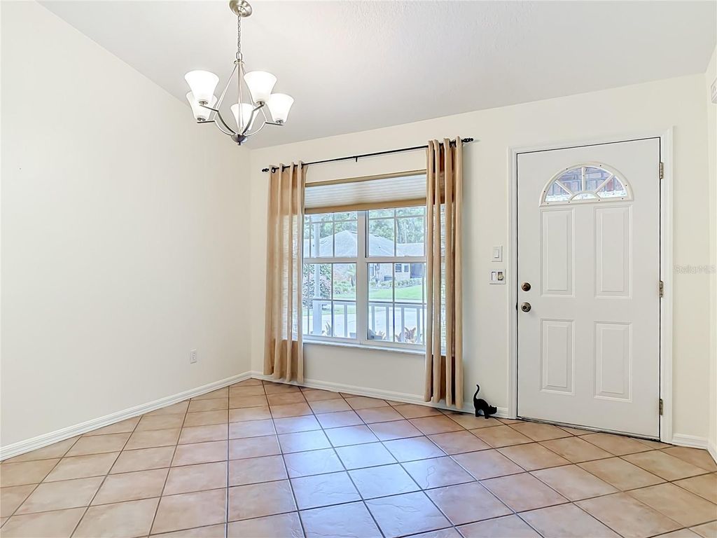 Photo of 405 Secluded Oaks Trail, Deland, FL 32724 (MLS # O6406994)