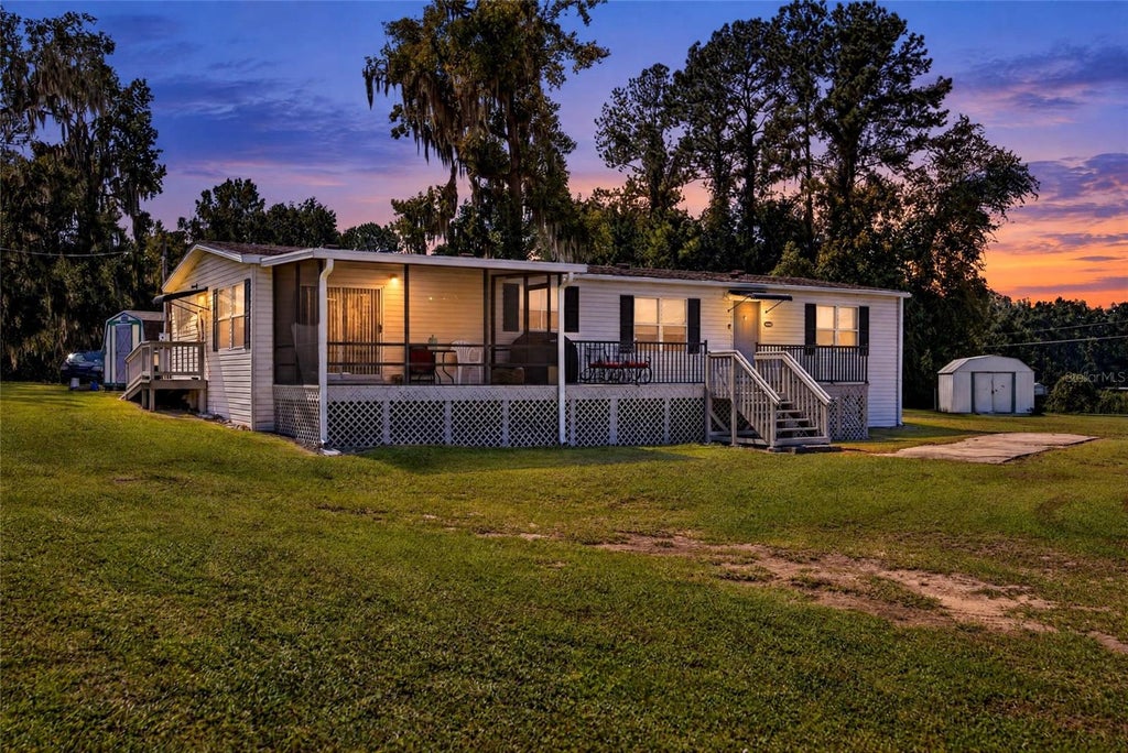 Photo of 12426 SE 55th Avenue Road, Belleview, FL 34420 (MLS # OM734144)