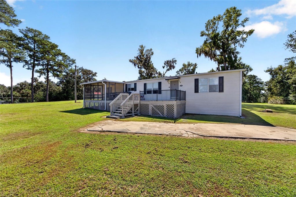Photo of 12426 SE 55th Avenue Road, Belleview, FL 34420 (MLS # OM734144)