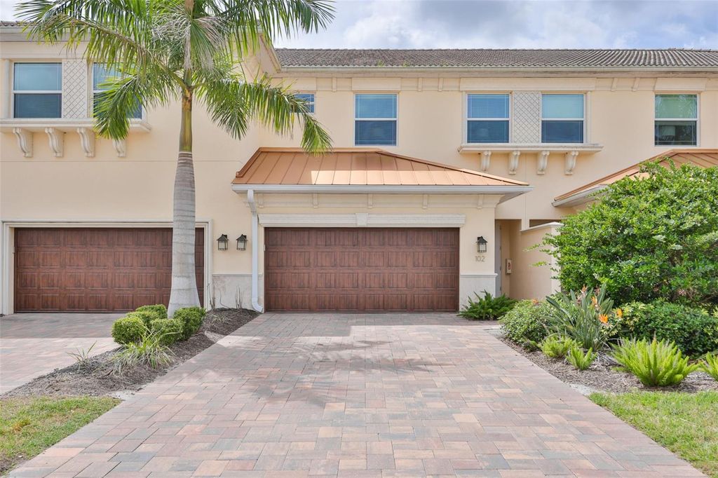 Photo of 7835 Hidden Creek Loop #102, Bradenton, FL 34202 (MLS # A4689378)