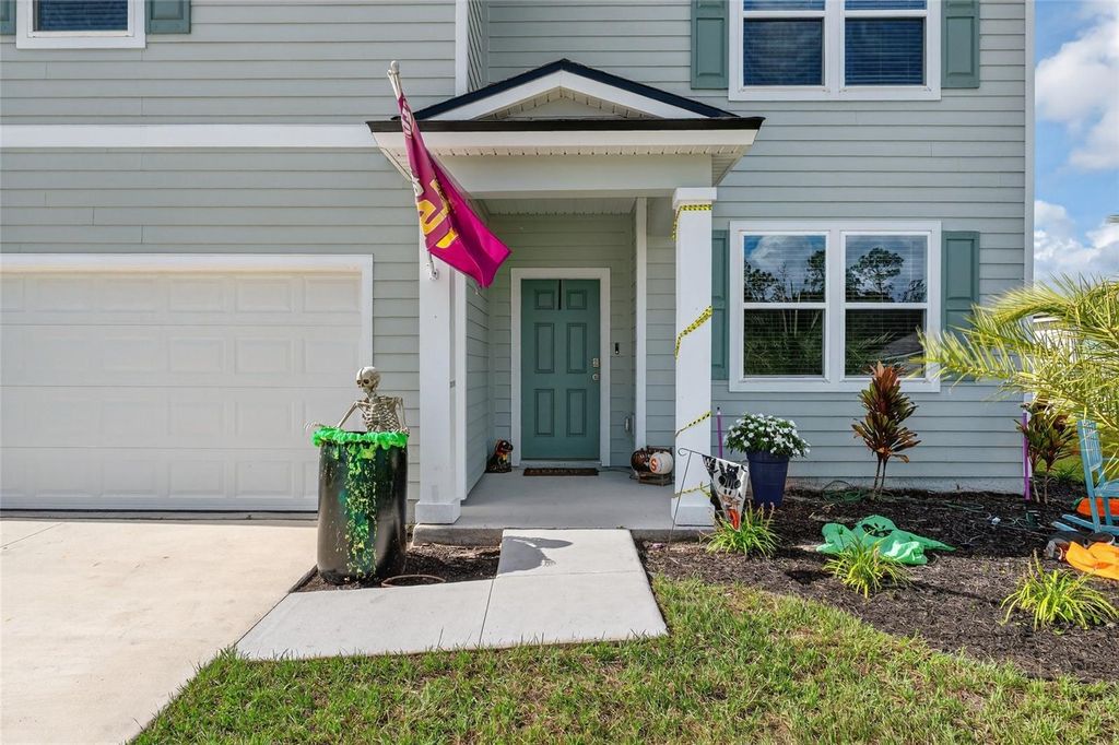 Photo of 125 Hulett Woods Road, Palm Coast, FL 32137 (MLS # FC312931)