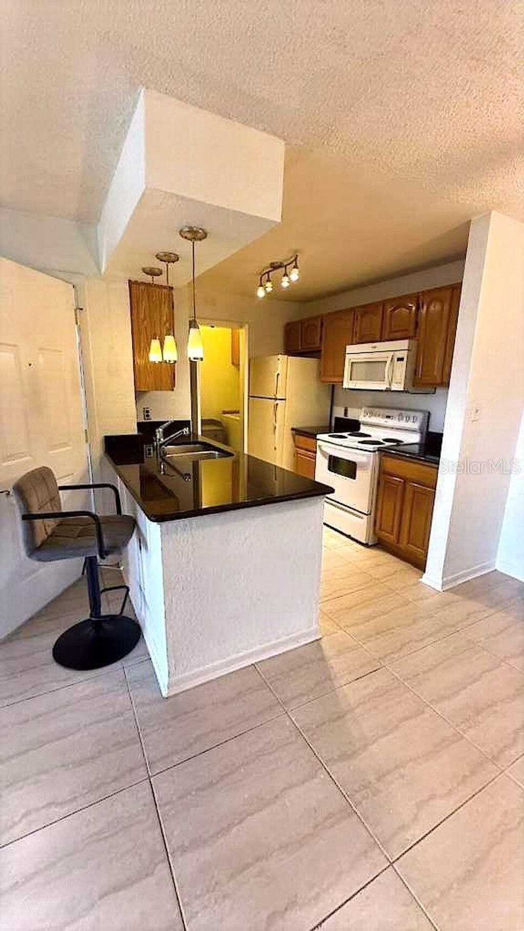 Photo of 5601 Rosebriar Way #S106, Orlando, FL 32822 (MLS # O6400271)