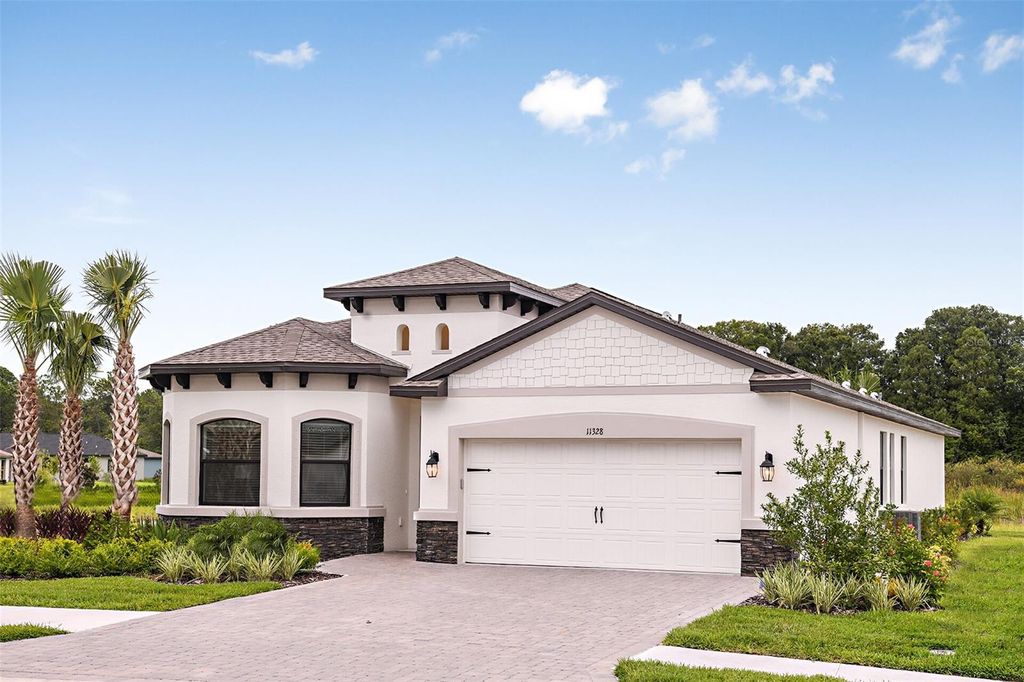 Photo of 11377 Weaver Hollow Road, New Port Richey, FL 34654 (MLS # J987004)