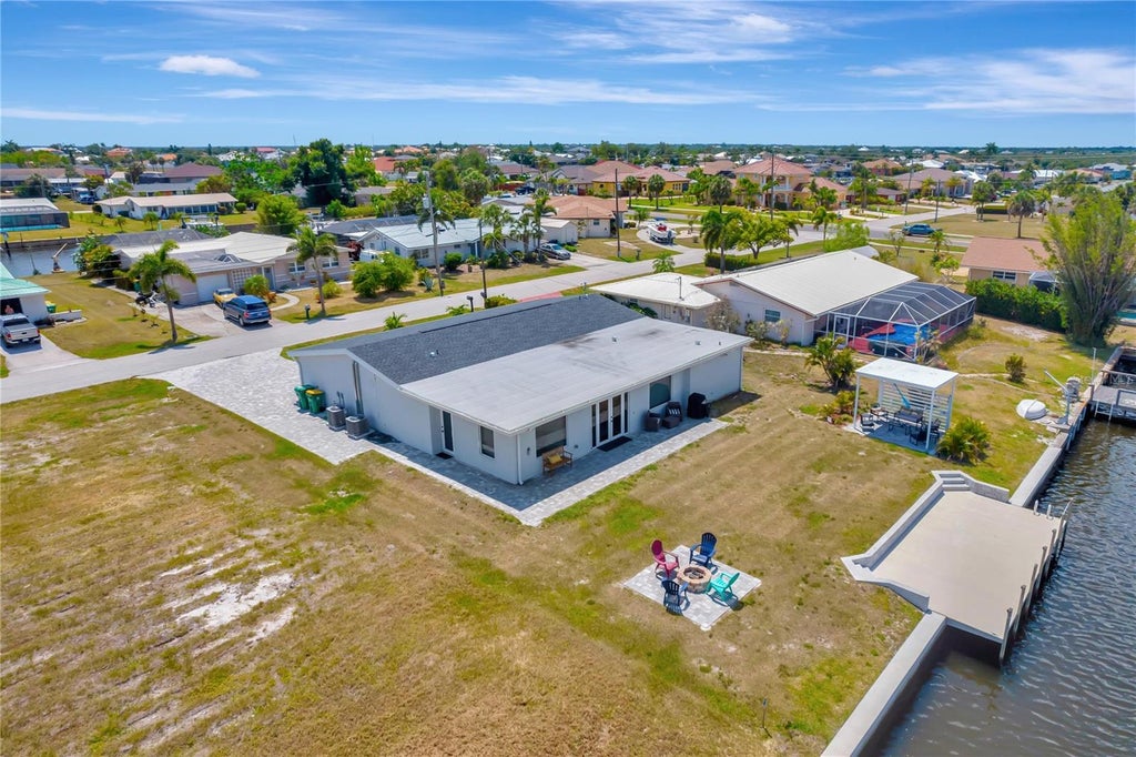 Photo of 106 Leland Street SE, Port Charlotte, FL 33952 (MLS # O6448609)