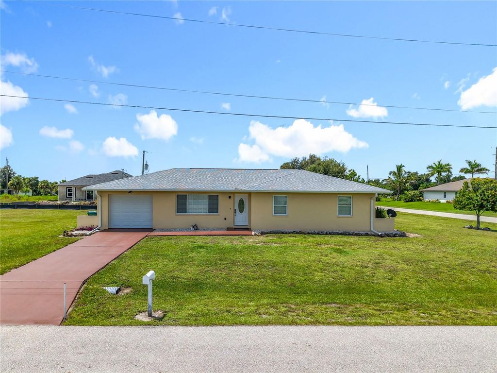 Photo of 19359 Boulder Avenue, Port Charlotte, FL 33954 (MLS # TB8419095)