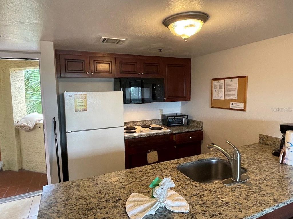 Photo of 6336 Parc Corniche Drive, Orlando, FL 32821 (MLS # O6376658)