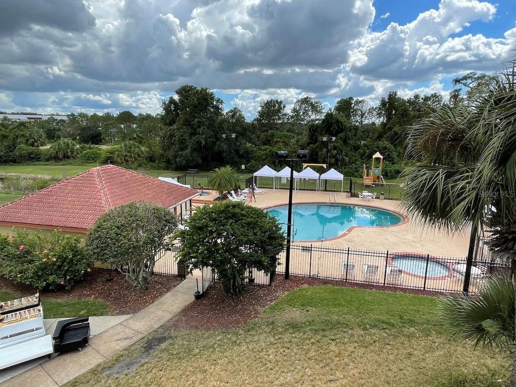 Photo of 6336 Parc Corniche Drive, Orlando, FL 32821 (MLS # O6376658)