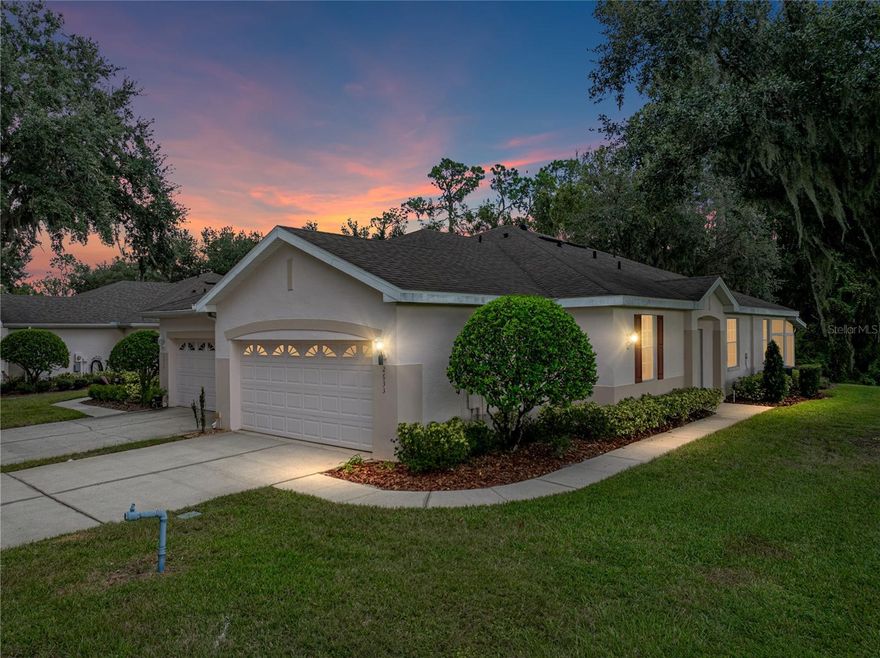 Elegant End-Unit Duplex Condo in Sought-After Eagle Greens at Walden Lake!  Welcome home to this beautifully updated 2-bedroom, 2-bathroom duplex-style condo nestled in the desirable Eagle Greens section of Walden Lake—one of Plant City’s most established and scenic communities.  This charming end unit offers the perfect blend of comfort, style, and privacy. Step inside to discover a light-filled open floor plan with gleaming hardwood floors that flow seamlessly throughout the entire home (except for the bathrooms), creating a warm and inviting atmosphere. The spacious living and dining areas are perfect for entertaining or simply relaxing at home.  The kitchen is an efficient chef’s delight, featuring granite countertops, ample cabinetry, and layout that opens to the main living space—ideal for casual dining and conversation.  Retreat to the primary suite, which boasts an updated en-suite bathroom with modern finishes, generous closet space, and plenty of natural light. A well-appointed second bedroom and full guest bath offer additional comfort for family or guests.  One of the standout features of this home is the enclosed lanai, perfect for enjoying your morning coffee or unwinding in the evening while taking in the peaceful surroundings of the community.  Residents of Walden Lake enjoy access to miles of walking trails, a lakefront park, playgrounds, and the tranquil natural beauty that defines this beloved neighborhood—all just minutes from downtown Plant City and convenient to Tampa and Lakeland.  Don’t miss this rare opportunity to own a low-maintenance, move-in-ready home in one of Plant City’s premier communities.