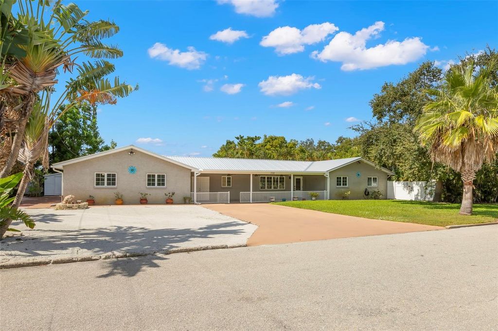 Photo of 208 77th Street W, Bradenton, FL 34209 (MLS # TB8437140)