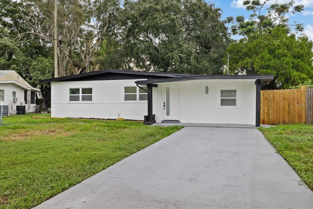 Photo of 7361 Royal Palm Drive, New Port Richey, FL 34652 (MLS # TB8557021)