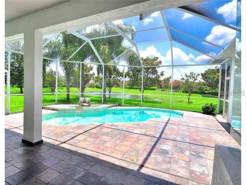 Photo of 8602 Herons Cove Place, Tampa, FL 33647 (MLS # TB8476062)