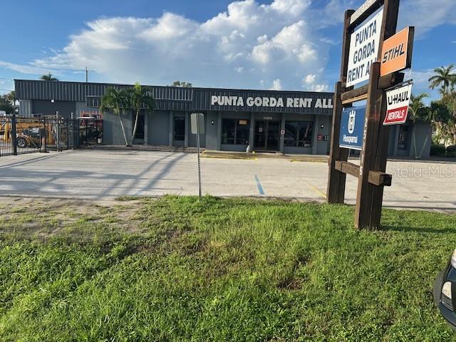 REAL ESTATE ONLY - Welcome to 25115 Marion Avenue in Punta Gorda, Florida — a prime commercial property offering space, visibility, and flexibility in one of Southwest Florida’s most accessible locations. This long-standing business site sits on 1.47 acres and features 7,256 square feet of showroom, warehouse, and storage space. Zoned Commercial General (CG) and OMI, it provides an excellent foundation for a wide variety of business types, from service and trade operations to destination-driven concepts.
Originally constructed in 1974, the property has been extensively upgraded to meet modern business needs. Improvements include a new roof, new HVAC systems, updated electrical, LED lighting, generator transfer switch, and fresh exterior paint. A newly renovated showroom provides a professional environment for customer-facing operations, while the warehouse and storage areas offer functionality and efficiency. The site is fully secured with new perimeter fencing, and city water and septic are in place for reliable service.
Location is another standout feature. With direct access to I-75 at Exit 164, close proximity to US-17 and US-41/Tamiami Trail, and only 4.5 miles from Punta Gorda Airport, the property offers outstanding connectivity for local, regional, and statewide business. The 1.47-acre parcel allows for ample parking, outdoor storage, or possible expansion to fit future growth.
The versatility of this property opens opportunities for a range of commercial uses. Contractors, landscapers, or service companies will find the combination of showroom, office, warehouse, and secured yard space ideal for operations. Businesses specializing in trailer sales, equipment rental, storage, or wrecker services will appreciate the visibility and layout. For entrepreneurs seeking to create a destination business, the size and location of the property lend themselves perfectly to a unique microbrewery or restaurant with event space that could serve both locals and visitors.
With its strong infrastructure, recent upgrades, and strategic location, 25115 Marion Avenue stands out as a rare commercial property ready to support a wide range of business opportunities. Whether you are expanding your operations, relocating a growing business, or investing in Punta Gorda’s future, this property offers the space, flexibility, and accessibility to make your vision possible.
