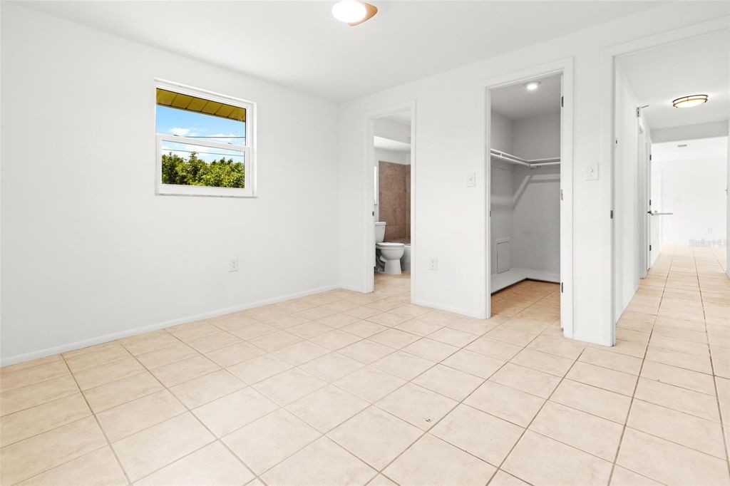 Photo of 1057 Tropical Avenue NW, Port Charlotte, FL 33948 (MLS # C7522194)