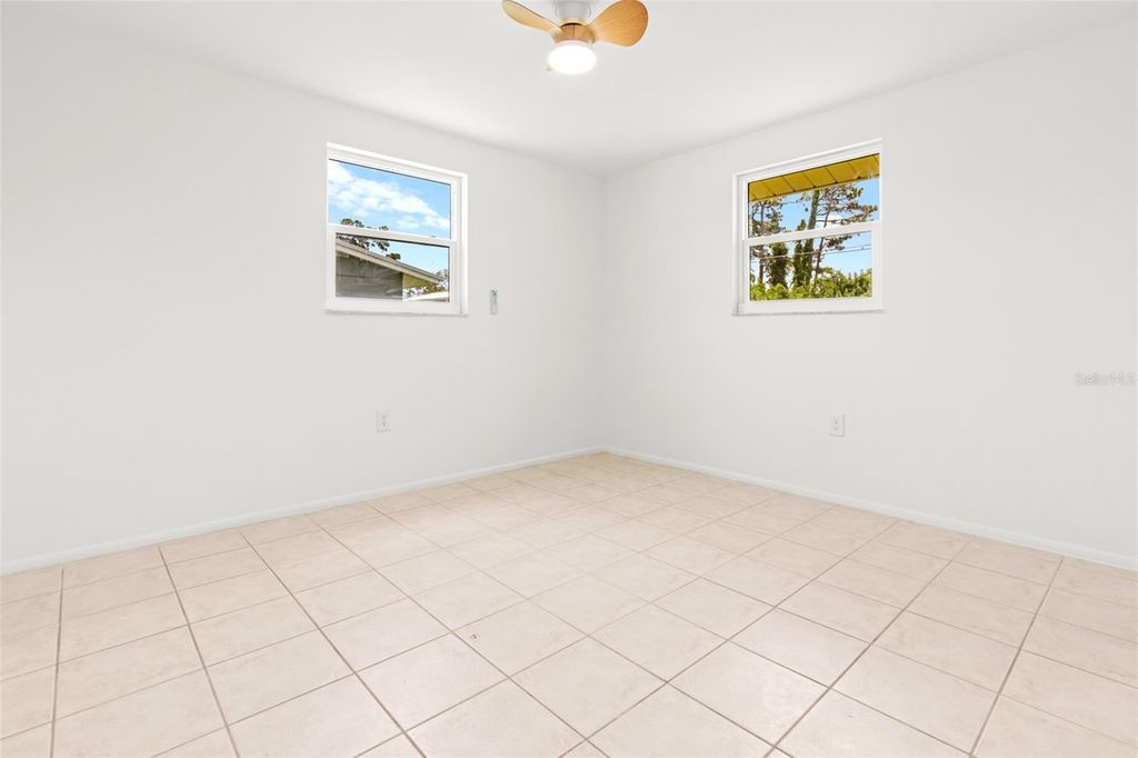 Photo of 1057 Tropical Avenue NW, Port Charlotte, FL 33948 (MLS # C7522194)