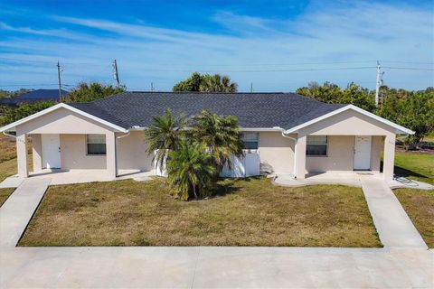 Photo of 305 Boundary Boulevard #A-B, Rotonda West, FL 33947 (MLS # D6140445)