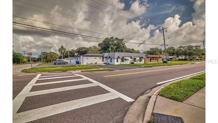 Discover a lucrative investment opportunity with this Clearwater office building, boasting an EXCELLENT CAP rate. Situated on a high-traffic main road, just minutes from the city center, this property features six revenue-generating units, three bathrooms, and two kitchens (one shared), ensuring versatile tenant. Many improvements have been made to the building including A.C, water heater and electrical panels, paint, new flooring 2024, new roof 2024. Make your appointment today to see this updated revenue generating unit.This property offers exceptional value with nine parking spaces. The combination of prime location, recent renovations, and diverse unit configurations makes this office building a highly attractive investment for those seeking consistent revenue and long-term growth. Schedule your showing today to capitalize on this exceptional opportunity.