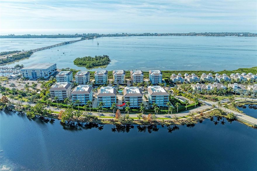 Welcome home to this stunning, move-in-ready condominium offering expansive water views of tranquil Sapphire Lake. Embrace the Margaritaville lifestyle in this beautifully appointed 3-bedroom, 3-bath residence located within the gated Marina Walk community of One Particular Harbour on Anna Maria Sound. Built to withstand Florida’s elements, this solidly constructed home also boasts an excellent rental opportunity, making it an outstanding investment opportunity.

Start your mornings on the expansive private screened lanai, savoring a cup of coffee as the sun rises over Sapphire Lake and the protected mangroves of Perico Preserve. This amazing condo showcases high-end upgrades throughout, including LG stainless steel appliances, solid wood cabinetry, quartz countertops, custom lighting in the kitchen and dining areas, and elegant wood plank tile flooring in the main living spaces. Additional features include an open-concept floor plan filled with natural light, an assigned under-building parking space, and a private storage room perfect for beach gear. This light, bright, and airy home is designed to impress, with high ceilings and a dramatic wall of glass sliders that flood the space with natural light and showcase serene water views. Elevated décor creates a warm, inviting atmosphere throughout. A thoughtfully designed split floor plan offers privacy for all, separating the primary suite from the guest bedrooms. With two additional bedrooms, there’s plenty of room for family and friends to relax comfortably—along with ample space and amenities to keep everyone entertained. The amazing furniture is negotiable. This community is a gated community with 24 hour virtual guard and pest guard control.

Located within the highly sought-after Harbour Isle community, residents enjoy resort-style amenities designed for relaxation and recreation. Unwind at the private beach club overlooking Anna Maria Sound, complete with the Sky Bar restaurant, a heated resort-style pool and spa, and a state-of-the-art 4,200-square-foot fitness center. The community also offers four pools, cabanas, a splash pad, grilling areas, a playground, fire pit, kayak launches, scenic walking trails, and a full-time activities director hosting a variety of events.

Just under a mile away, Anna Maria Island offers pristine beaches, charming island ambiance, over 30 dining options, and boutique shopping. Boating enthusiasts will appreciate the nearby Safe Harbour Marina at Pier 77, only a short walk from the condo. Steps outside the gated community, enjoy Floridays Restaurant and the Compass Hotel, both inspired by the Margaritaville lifestyle. Nature lovers will love being only two miles from Robinson Preserve, featuring miles of trails for walking, biking, and kayaking, as well as easy access to three nearby nature preserves. Pickleball enthusiasts will enjoy the state-of-the-art G.T. Bray Recreation Center, located just five miles away, offering 20 courts—14 of them covered.

This is truly paradise. Whether you’re seeking a full-time residence, a vacation getaway, or a lucrative investment property, this exceptional condo delivers it all. Schedule your private showing today and experience the breathtaking water views and unmatched lifestyle that await you at award-winning Harbour Isle.