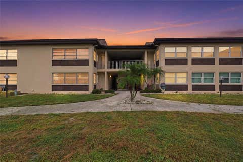 Photo of 5242 Opal Lane #104, New Port Richey, FL 34652 (MLS # W7887268)