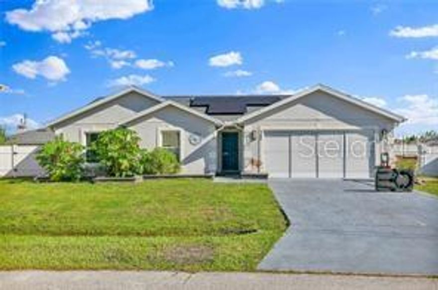 Welcome to this beautiful 3-bedroom, 2.5-bath single-family home nestled in the sought after Poinciana Villages, Neighborhood 3. Built in 2017, this modern open-concept layout offers 1,622 sq ft on a spacious 0.22-acre lot with laminate flooring in the main areas and ceramic tile in the kitchen and baths — easy maintenance, no carpet. The kitchen has been tastefully updated, and fresh paint flows throughout. The master suite is a true retreat, with a large walk-in closet and plenty of natural light. A cozy office space adds flexibility (storage, work-from-home, etc.). Step outside through sliding doors to enjoy the generous lot, perfect for outdoor living.HOA makes life easy — bulk cable & internet included, plus access to resort-style community amenities: pool, playground, fitness center, park & gymnasium. Solar panels will transfer to the new owner. Located for convenience, you're close to highways, shopping, supermarkets and more.