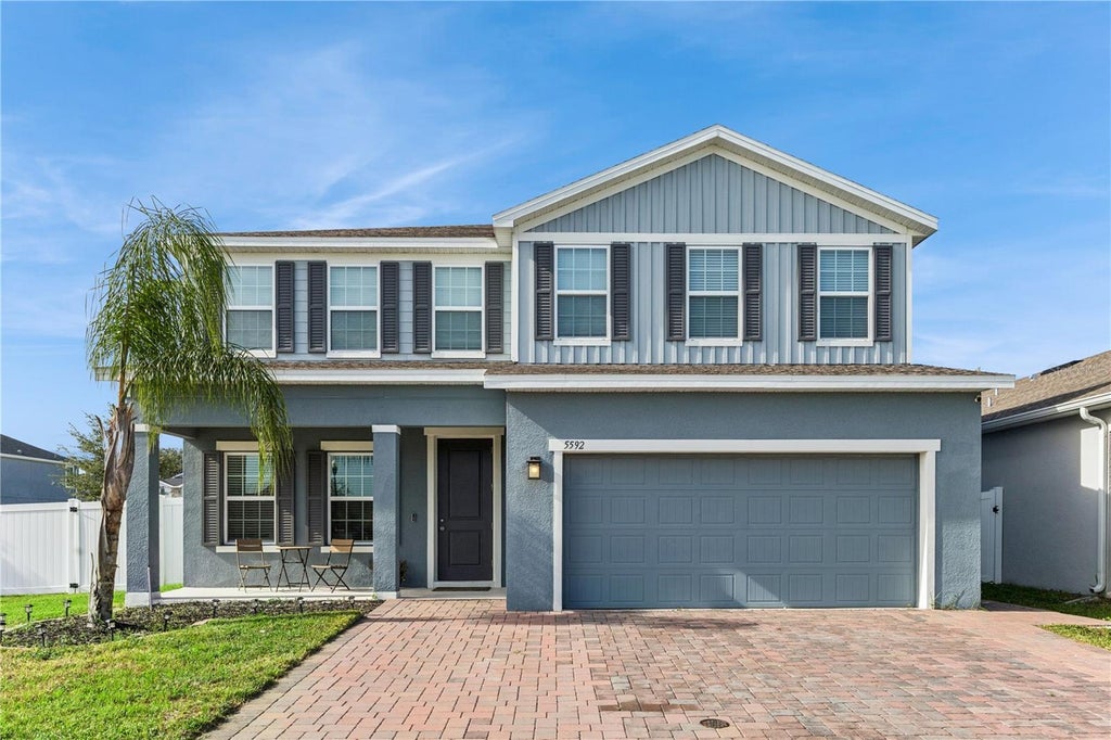 Photo of 5592 Vigo Loop, Saint Cloud, FL 34771 (MLS # O6429826)