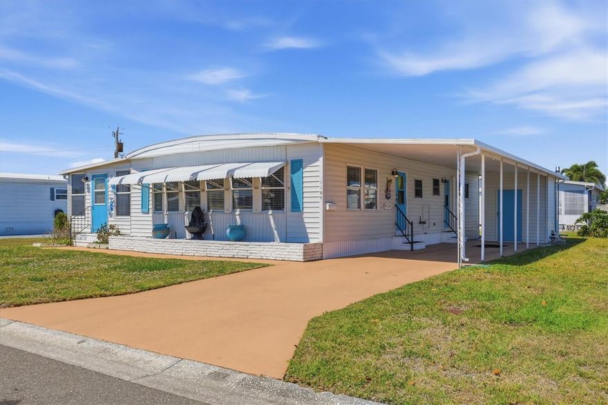 Welcome to Tidevue Estates, a land-owned active 55+ community offering the perfect Florida lifestyle! This tastefully updated, turnkey furnished home is move-in ready and filled with charm and comfort. The bright kitchen features a smooth-top stove, tile backsplash, breakfast counter, and ample space for cooking and entertaining. Laminate flooring and 2-inch blinds run throughout the home, creating a clean, cohesive look. The spacious living room is filled with natural light, while the 21x12 Florida room adds valuable extra living space with a wall of glass windows—perfect for relaxing or hosting guests year-round. Recent updates include a membrane roof and three new mini-split A/C systems for energy-efficient comfort. The primary bedroom offers built-in storage with a dresser and two wardrobe closets, along with an en-suite bathroom featuring a walk-in shower. Enjoy outdoor living under the large carport, with plenty of room to create your own outdoor lounge area while still accommodating your car and golf cart. This home is ideal as a seasonal retreat or full-time residence—come enjoy the easy, active lifestyle Tidevue Estates has to offer!  Low HOA of only $600 annually. Pets are not permitted. Plenty of activities to keep you busy in this community. Updated fitness center. Meet friends and make new ones for a game of indoor pickleball, bocce ball, or shuffleboard. Join the Golf League. Take a bike or golf cart ride to Veterans Park to watch the wildlife and enjoy the sunset. Ellenton Premium Outlet Mall, restaurants, and medical facilities are just minutes away. Easy access to I-75 to explore Sarasota. Not to mention a short drive to our beautiful Gulf Beaches.This well-maintained, stylishly updated home is ready for its next owner. Don’t miss this opportunity—move in and start enjoying the Florida lifestyle today!