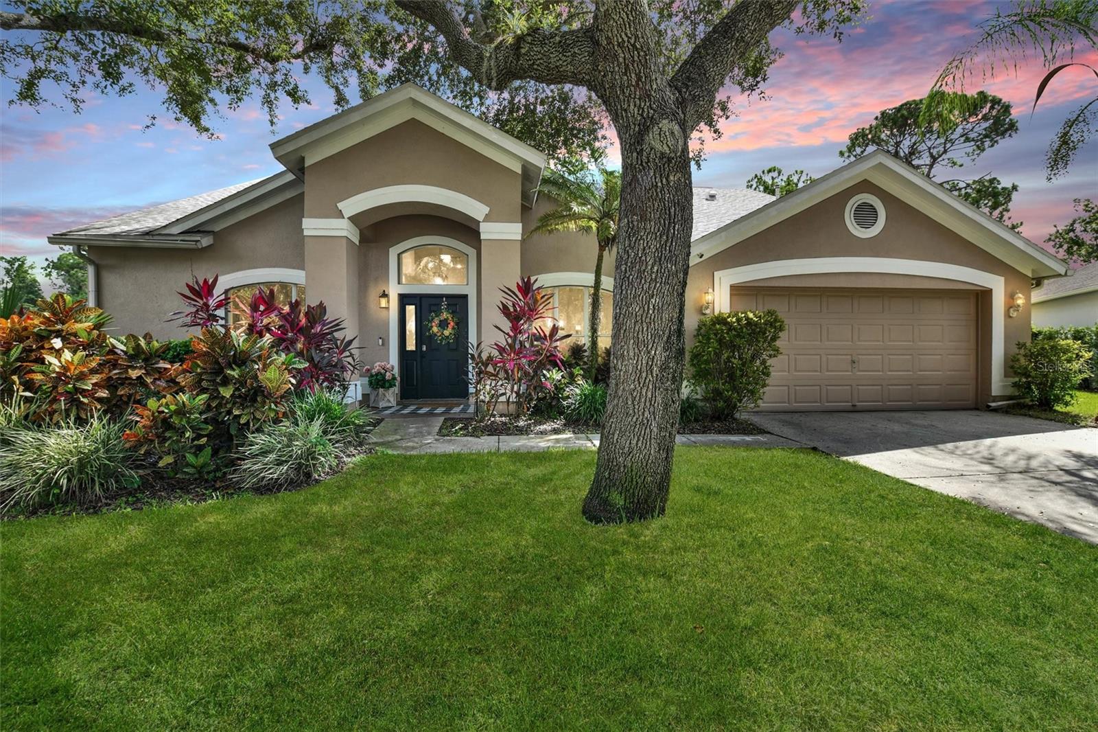 Welcome home to this gorgeous waterfront luxury 5 bedroom 3 bathroom home. When you walk inside you will be amazed by the immediate view of the pool from the front door, then walk in further into this grand open concept plan you notice the super high ceilings with gas fireplace and large slider doors leading to your view of the pool, pond, and conservation area. The kitchen is absolutely stunning and equipped with extra tall white cabinets, high end quarts counter tops, large white subway tile backsplash, and stainless steel appliances. The floorplan of this house is amazing with the bedrooms being split into three corners. The master bedroom and bathroom are a dream come true. The master bedroom is spacious with large his and hers walk in closets and the master bathroom has double his and her sinks, marble flooring, quartz countertops, a gigantic jet tub, a big separate tile walk in shower and a separate toilet room. As you walk out on the back lanai take in the breathtaking views and sounds of nature coming from the pond and conservation area. The pool is a salt water pool and heated so you can use it all year long! Westchase is a golf course community with multiple pools, tennis/pickleball courts, many playgrounds, and tons of wide sidewalks and trails. This home is within one of the most desired neighborhoods of Westchase Keswick Forest with its beautiful Oak lined Forest style entry and its within walking distance (less than 10 minutes) to Publix, restaurants, banks, doctors offices, fitness, spa etc. You could drive into Westchase and never leave almost every amenity is here with multiple fitness concepts, food concepts, grocery stores, Starbucks etc. All extremely close to the Tampa International Airport (about 20 minutes) and some of Florida's most gorgeous beaches (about 35 minutes). OWNER/AGENT