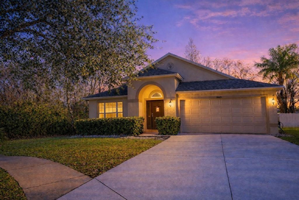 Photo of 5843 Count Turf Lane, Wesley Chapel, FL 33544 (MLS # J998625)