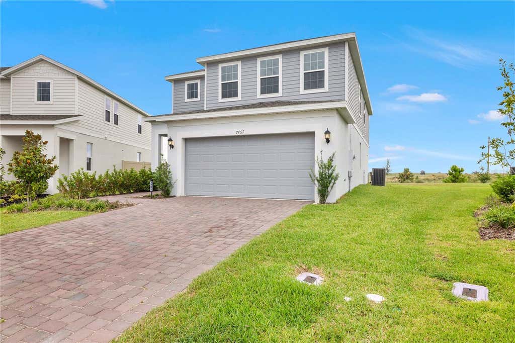 Photo of 7767 Trapani Loop, Clermont, FL 34714 (MLS # O6429154)