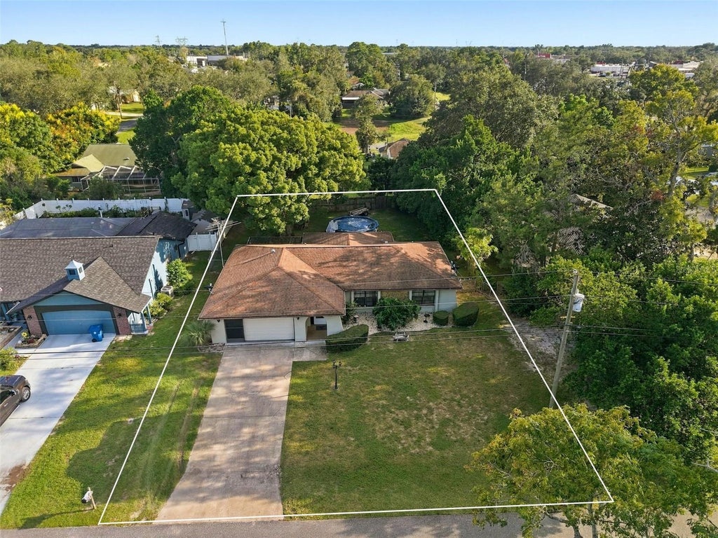 Photo of 11122 Maderia Street, Spring Hill, FL 34609 (MLS # W7890350)