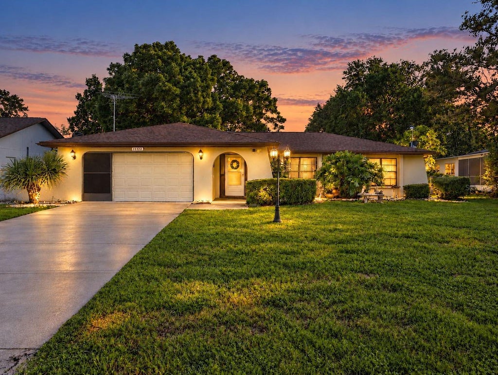 Photo of 11122 Maderia Street, Spring Hill, FL 34609 (MLS # W7890350)
