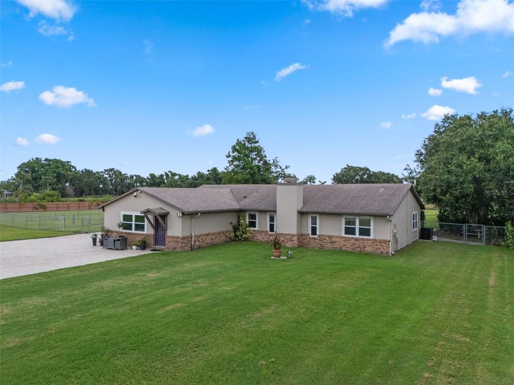 Photo of 2921 Lake Tohopekaliga Boulevard, Kissimmee, FL 34746 (MLS # O6393654)