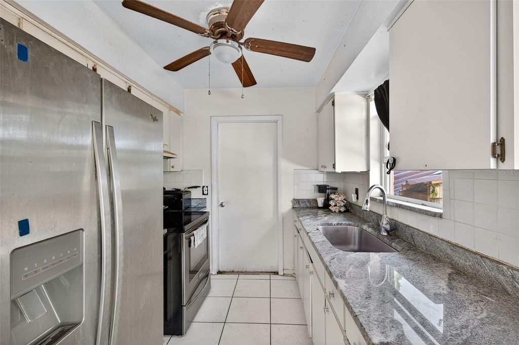 Photo of 7010 S Sandhurst Drive, Tampa, FL 33619 (MLS # TB8442712)