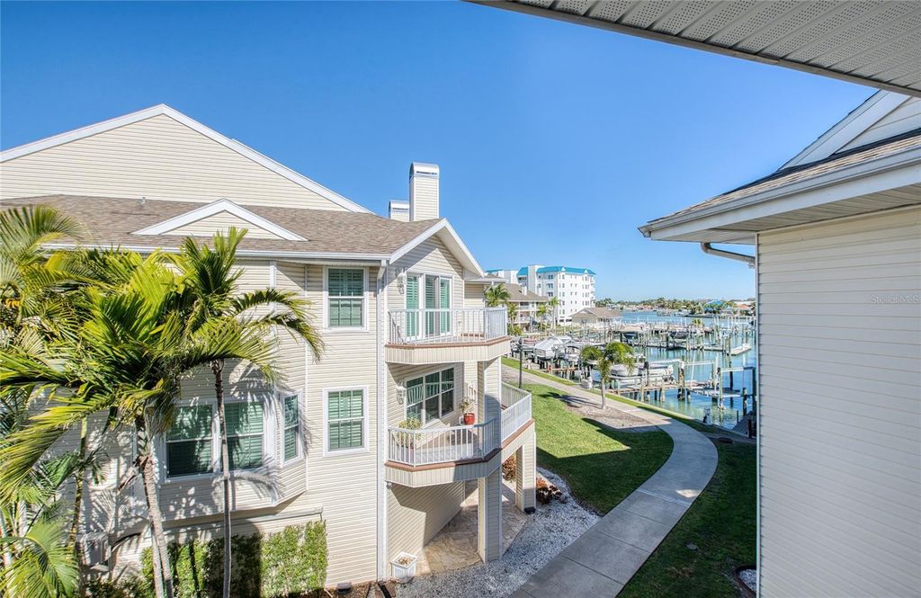 Photo of 9211 Captiva Circle, St Pete Beach, FL 33706 (MLS # TB8465170)