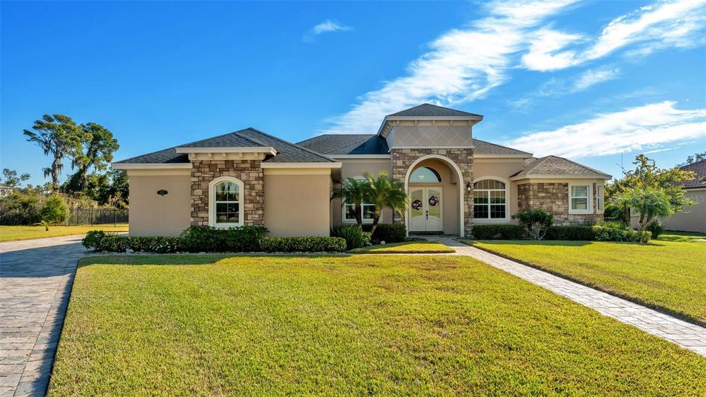 Photo of 6553 Heritage Park Place, Lakeland, FL 33813 (MLS # L4957016)