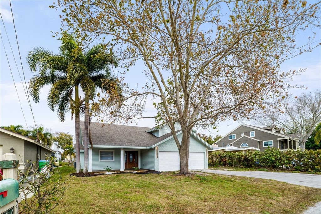 Photo of 3149 N Canal Drive, Palm Harbor, FL 34684 (MLS # TB8481430)