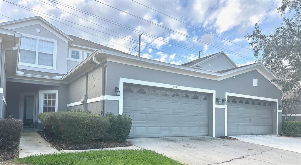 Photo of 1128 Travertine Terrace, Sanford, FL 32771 (MLS # O6438201)