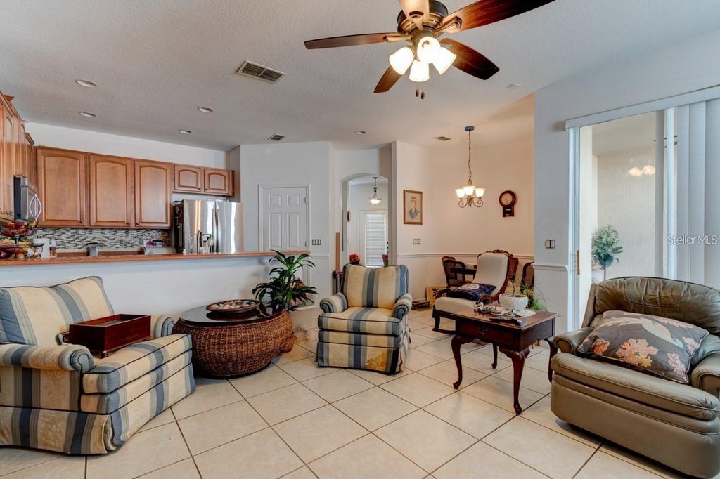 Photo of 1128 Travertine Terrace, Sanford, FL 32771 (MLS # O6438201)