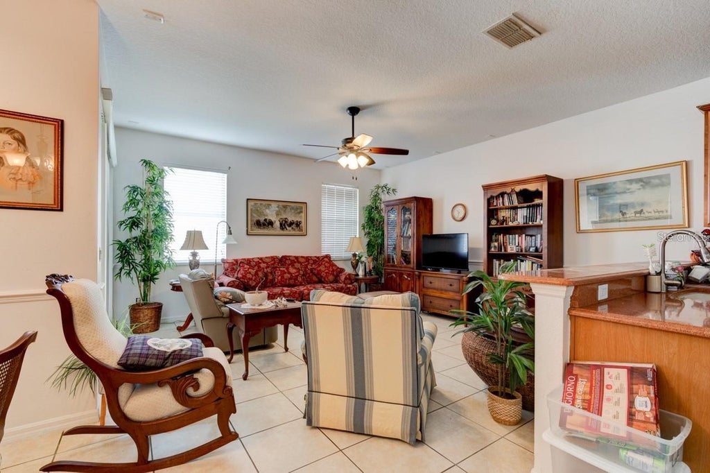 Photo of 1128 Travertine Terrace, Sanford, FL 32771 (MLS # O6438201)