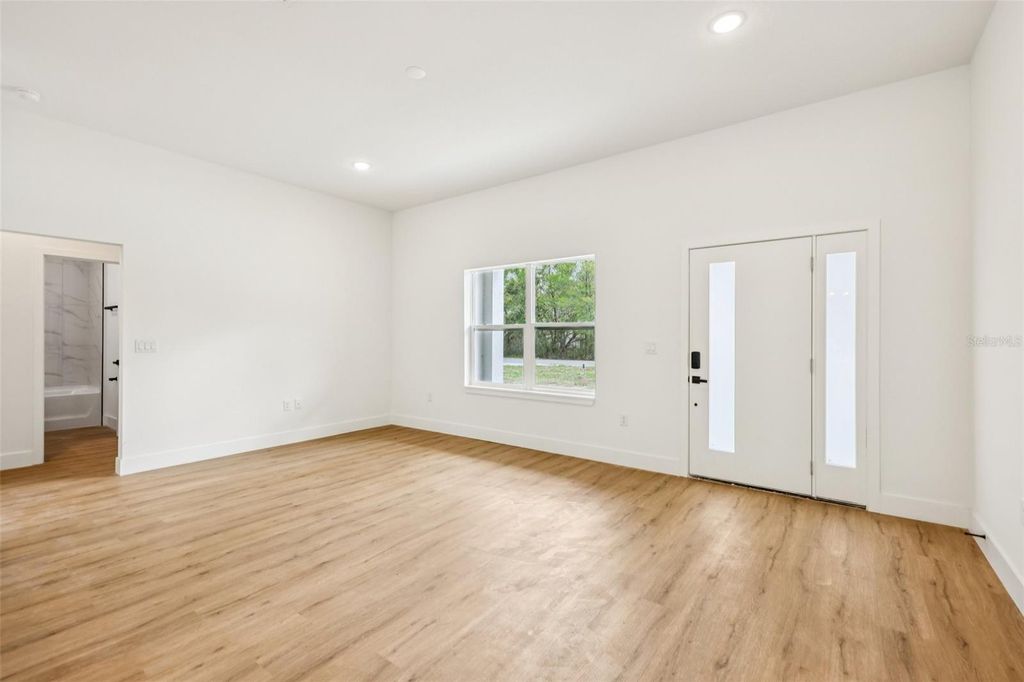 Photo of 80 Malauka Pass Course, Ocklawaha, FL 32179 (MLS # O6393712)