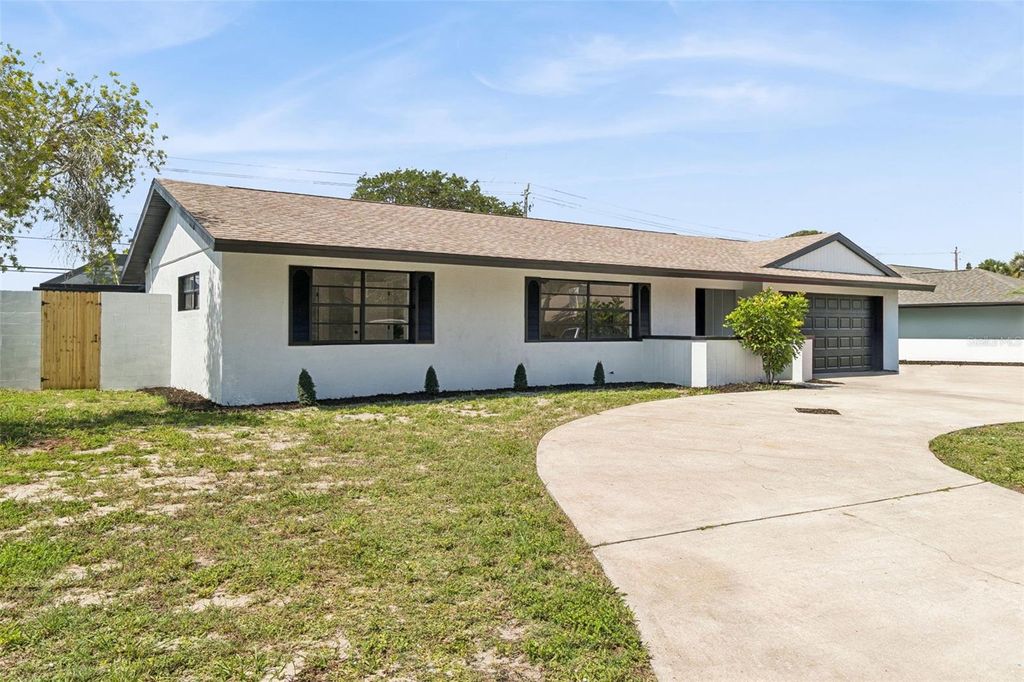 Photo of 381 E Riviera Boulevard, Indialantic, FL 32903 (MLS # O6419332)