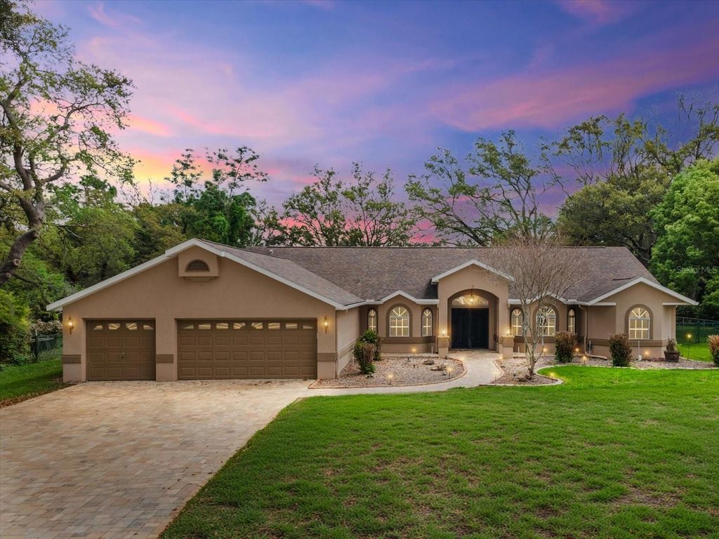 Photo of 18602 Winding Oaks Boulevard, Hudson, FL 34667 (MLS # TB8495825)